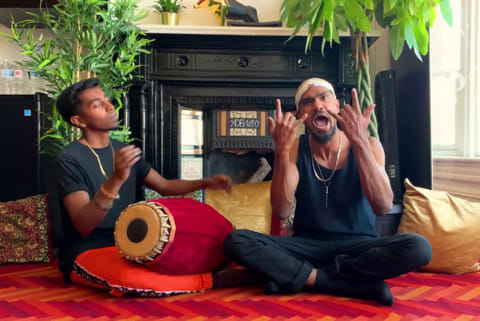 Yanchan Rajmohan (left) plays mridangam while Shan raps