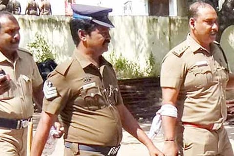 Aruppukkottai Deputy Superintendent of Police G Venkatesan, who was injured on his right arm during a tussle