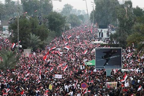 Iraqis mass to urge US troop ouster, rival rallies turn deadly