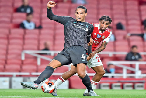 Liverpool central defender Virgil van Dijk (left) made a costly error and gifted Arsenal