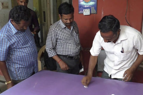 Officials investigating the spot where the SIs were caught red-handed in Tiruvannamalai