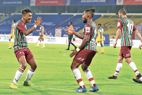 ATKMB duo of Prabir Das and Roy Krishna celebrate the latter?s winning goal against KBFC