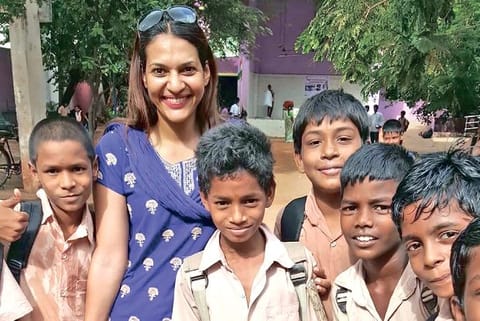 Poongkothai Chandrahasan with students