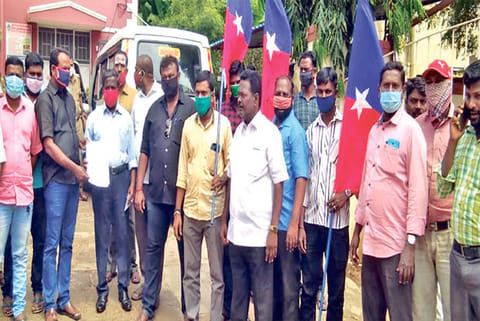 VCK cadre at the Ambur town police station with the petition demanding arrest of the former BJP coun