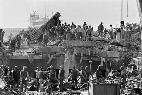 Rescuers continue to probe the wreckage of the U.S. Marine barracks a day after a suicide truck bomb