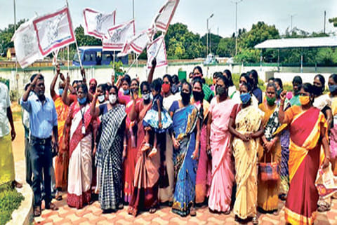 Women self-help group members complain against micro finance firms