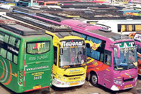 Omni buses at the bus depot in the city