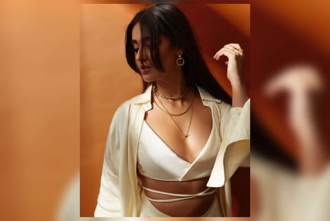 Ileana D'Cruz flaunts 'golden glow' in white cut-out number