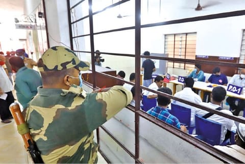 Representative image of a security guard watching the voting at Velachery booth