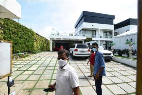 ED officials at a bungalow belonging to Sukesh Chandrasekhar