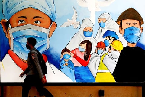 Promoting the use of protective face masks amidst the Omicron variant (Credit: Reuters)