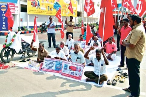 CPM members staging protest against fuel price hike in Tiruchy on Friday