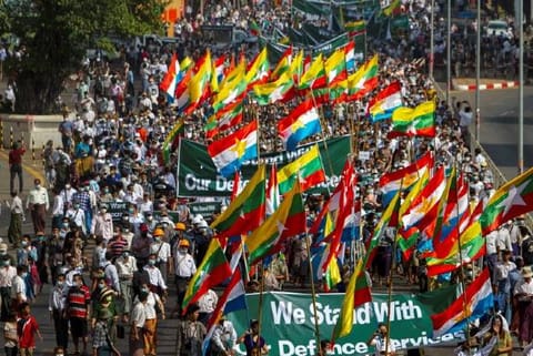 Supporters of Myanmar coup attack rival in Yangon