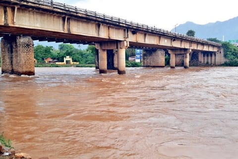 Bhavani river in spate near Mettupalayam on Friday