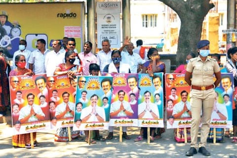 DMK supporters wait outside as Stalin files his papers