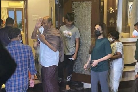 Rajinikanth with his daughter returning from Hospital