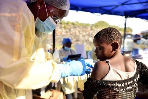 A health worker administering Ebola vaccine. File photo: Reuters