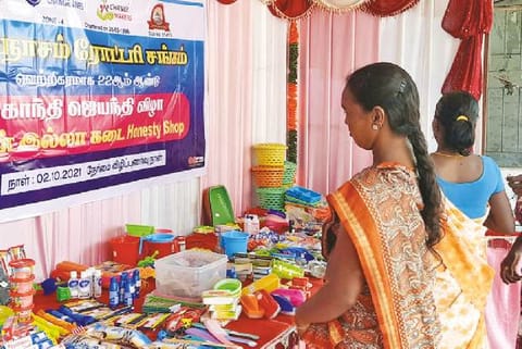 Public picking up articles from honesty shop at Papanasam in Thanjavur on Saturday