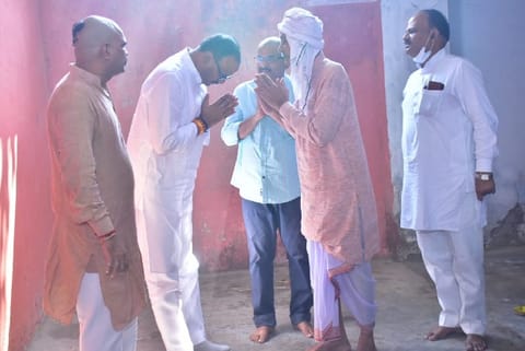Minister Brajesh Pathak meeting with Shubam Mishra's family. Image: Twitter - @brajeshpathakup