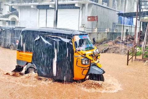 The flooded Bazaar Road in Pandalur in The Nilgiris district on Monday
