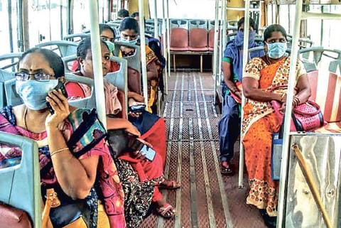 Women travelling in bus after the Covid lockdown restrictions were relaxed