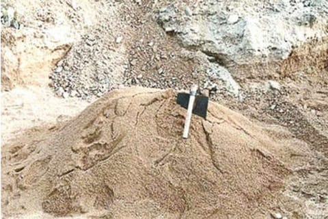 Mined sand from Malattar left behind after attack on two farmers at Masigam near Pernambut
