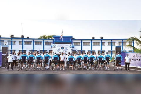 Air warriors assembled with their bicycles.