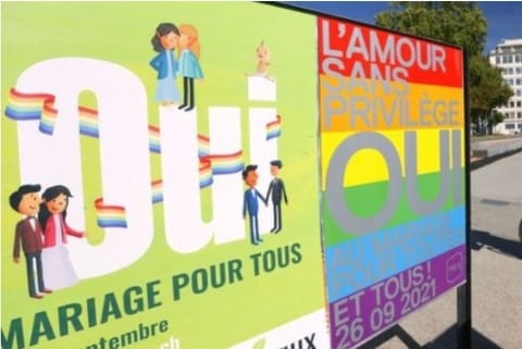 Posters are flaunted before election (Credit: Reuters)