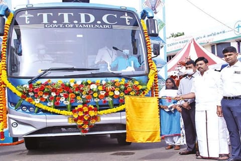 Tourism Minister Mathiventhan flagging off a bus carrying 11 social media influencers