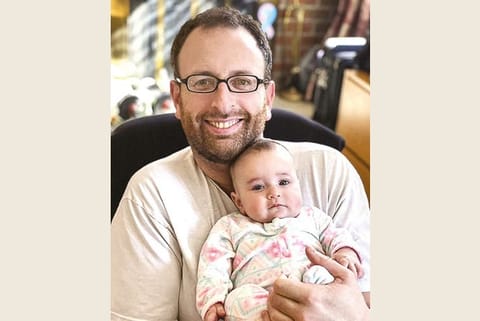 Dina Levy with her young daughter