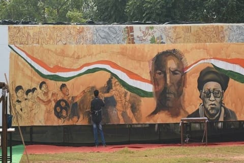 A picture of an artist working on a painting (Image credit: ANI)