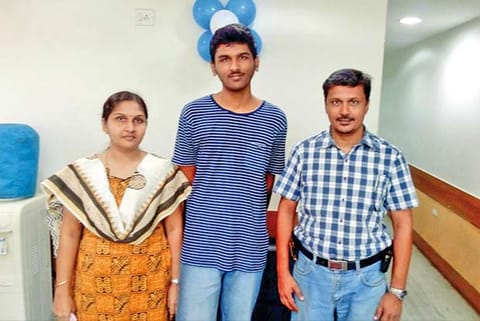 R Raghul, who came 73rd in IIT-JEE advanced, flanked by his parents