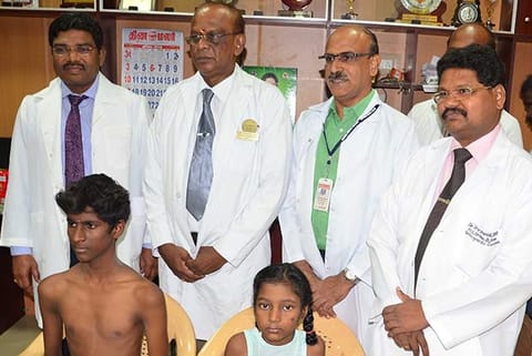 Ajith Kumar and Anish Rizwana with the team of doctors who performed the rare surgeries