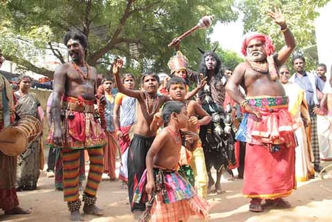 Members of various nomadic tribal communities dressed in their occupational attire