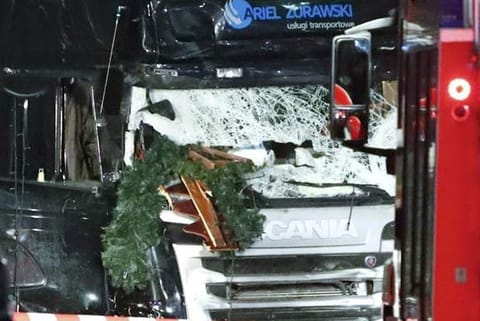 Truck ploughs into crowd at Berlin Christmas market, 12 dead