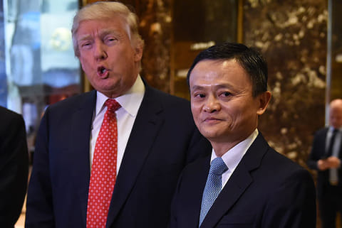 Jack Ma (R), founder and executive chairman of Alibaba Group, and President-elect Donald Trump