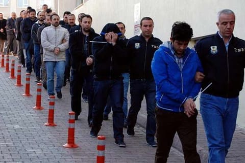 Suspected supporters of the U.S.-based cleric Fethullah Gulen are escorted by police officers