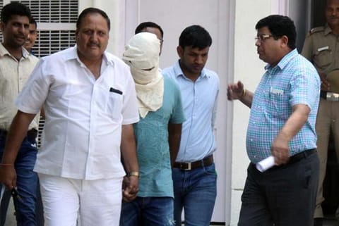 File photo of Sukesh Chandrasekhar being arrested by Delhi Police