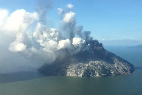 The remote island volcano of Kadovar spews ash into the sky in Papua New Guinea