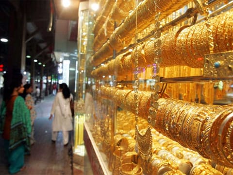 Gold ornaments on display at a store in Dubai's Gold Souk.