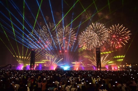 Visitors enjoy the fireworks display at the Dubai Festival City Mall on Eid Al Adha. Picture for illustrative purposes only.