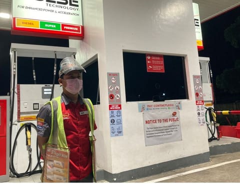 A petrol pump in the Philippines: The $100/barrel Brent crude price is seen as a key "threshold" where higher oil prices could start driving the cost of other commodities, raising inflationary pressures, as the per the Bangko Sentral.