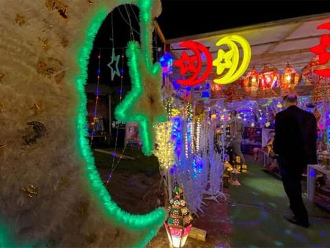 People shop for decorations for the holy month of Ramadan in Amman, Jordan. Technical glitch leads to early Maghrib call, prompting premature iftar in Jordan