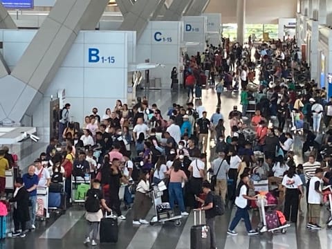 A scene at Manila's Ninoy Aquino International Airport Terminal 3. A false fire alarm delayed 59 commercial and cargo flights by an average of 45 minutes at the Philippines' main aviation gateway. File photo.