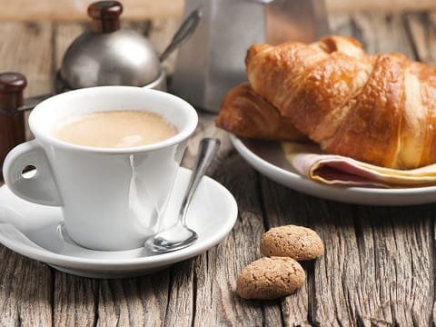 Contrary to habit, don’t gulp your coffee immediately after rolling out of bed. Cortisol levels are high in the morning, and caffeine can stress your system further and mess with metabolism