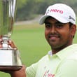 Indian golfer Anirban Lahiri poses with the trophy after winning
the Indian Open golf tournament in New Delhi yesterday.