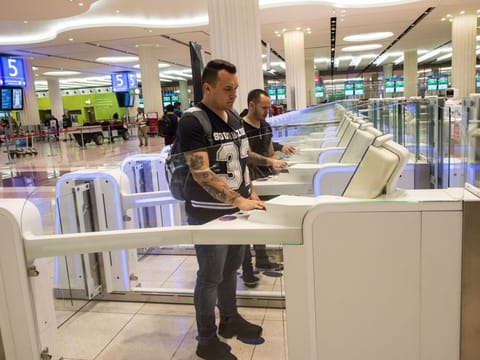 Passengers using smart gates at Dubai International Airport Terminal 3.