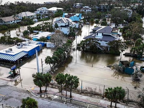 A drone image shows a flooded street due to Hurricane Milton in Siesta Key, Florida, on October 10, 2024.