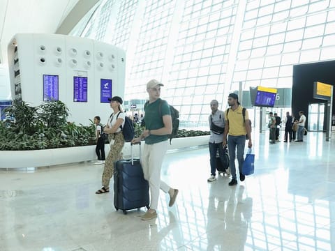 Passengers at the departures terminal at Abu Dhabi's Zayed International Airport. The hub welcomed over 29 million passengers last year.