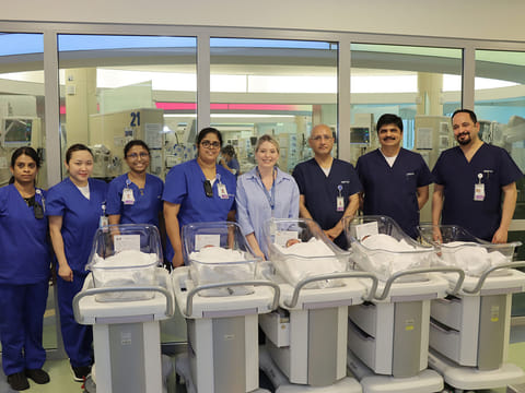 The quintuplets with part of the 45-member medical team at SSMC.